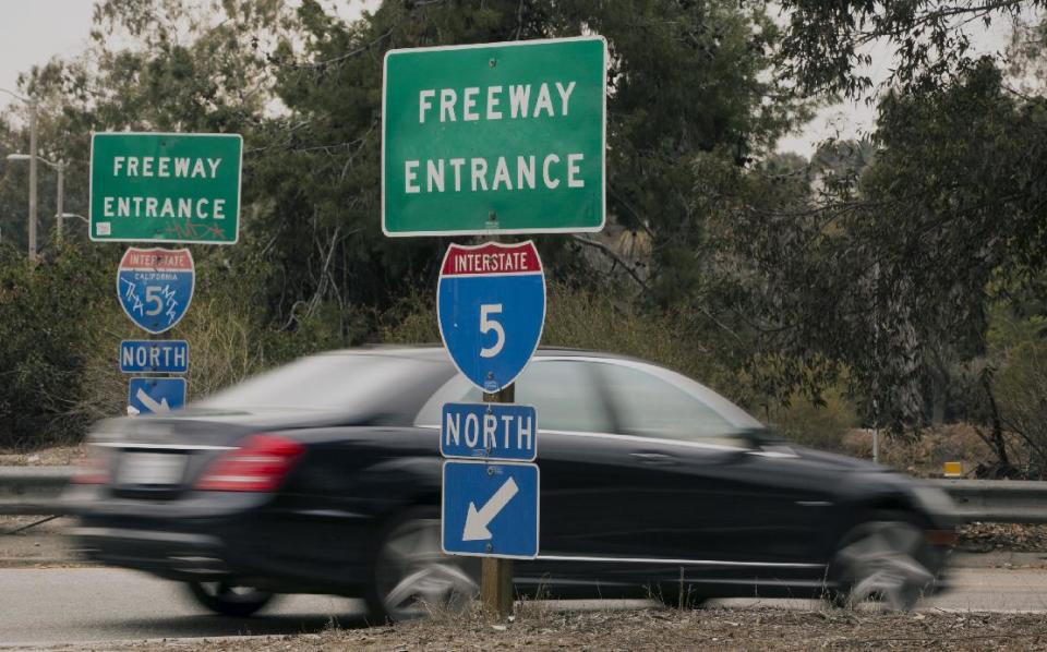 In this Thursday, Feb. 6, 2014 photo, a driver enters onto Interstate 5 in Los Angeles. In California, I-5 in Los Angeles County is the most congested route, according to new data from the California Department of Transportation. (AP Photo/Damian Dovarganes)