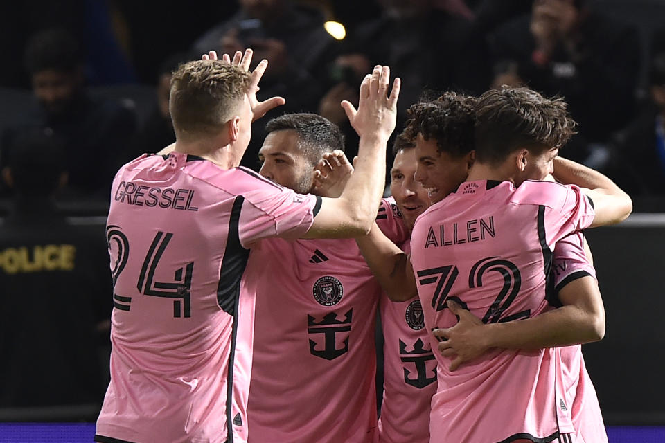 Inter Miami's players celebrate after scoring during the Riyadh Season Cup soccer match between Inter Miami and Al Hilal at Kingdom Arena Stadium in Riyadh, Saudi Arabia, Monday, Jan. 29, 2024. (AP Photo)