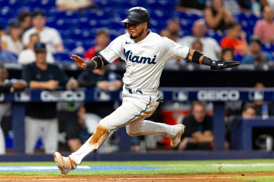 Miami Marlins base runner Luis Arraez (3) runs toward home before scoring a run due to a wild pitch by Kansas City Royals pitcher Jackson Kowar during the seventh inning of an MLB game at loanDepot park in the Little Havana neighborhood of Miami, Florida, on Tuesday, June 6, 2023.