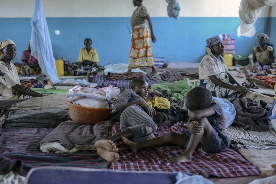 Residents take refuge at Ombaka Primary School after fleeing floodwaters that wreaked havoc in Ombaka Village, Kisumu, Kenya Wednesday, April 17, 2024. Heavy rains pounding different parts of Kenya have led to the deaths of at least 13 people and displaced some 15,000, the United Nations said, as forecasters warned more rains can be expected until June. (AP Photo/Brian Ongoro)