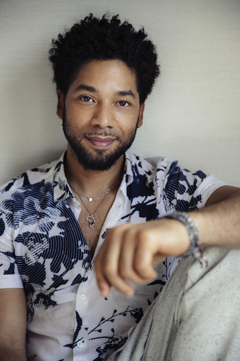 FILE - In this March 6, 2018 file photo, actor-singer Jussie Smollett, from the Fox series, "Empire," poses for a portrait in New York. Chicago police have opened a hate crime investigation after a man the department identified as a 36-year-old cast member of the television show “Empire” alleged he was physically attacked by men who shouted racial and homophobic slurs. Police wouldn’t release the actor’s name, but a statement from the Fox studio and network on which “Empire” airs identified him Tuesday, Jan. 29, 2019, as Jussie Smollett. (Photo by Victoria Will/Invision/AP, File)