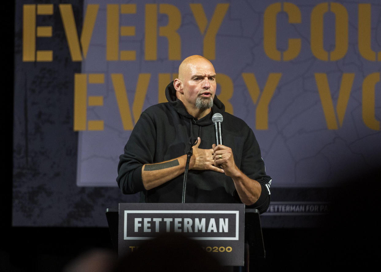 Lt. Gov. John Fetterman speaks at a podium.