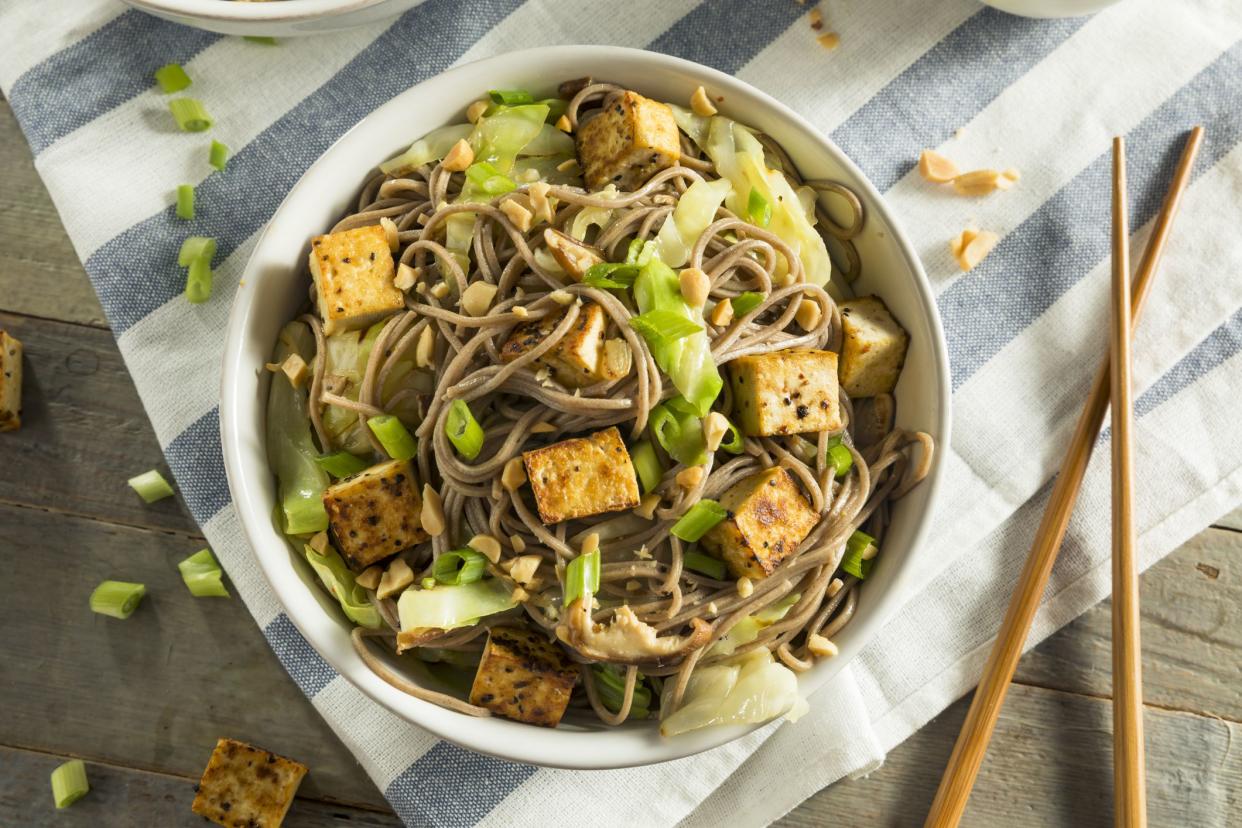 Homemade Asian Tofu Soba Noodle Bowl with Onions and Peanuts