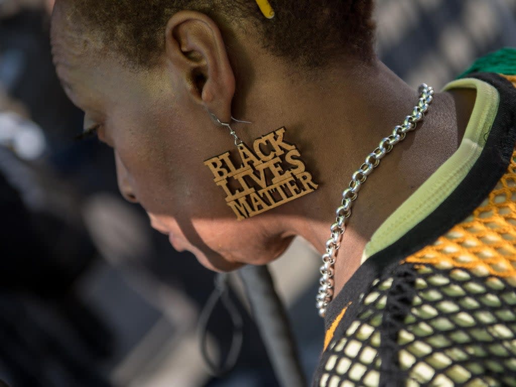 A demonstrator at a protest in support of the Windrush generation in Brixton, London, 20 April 2018 (Getty Images)