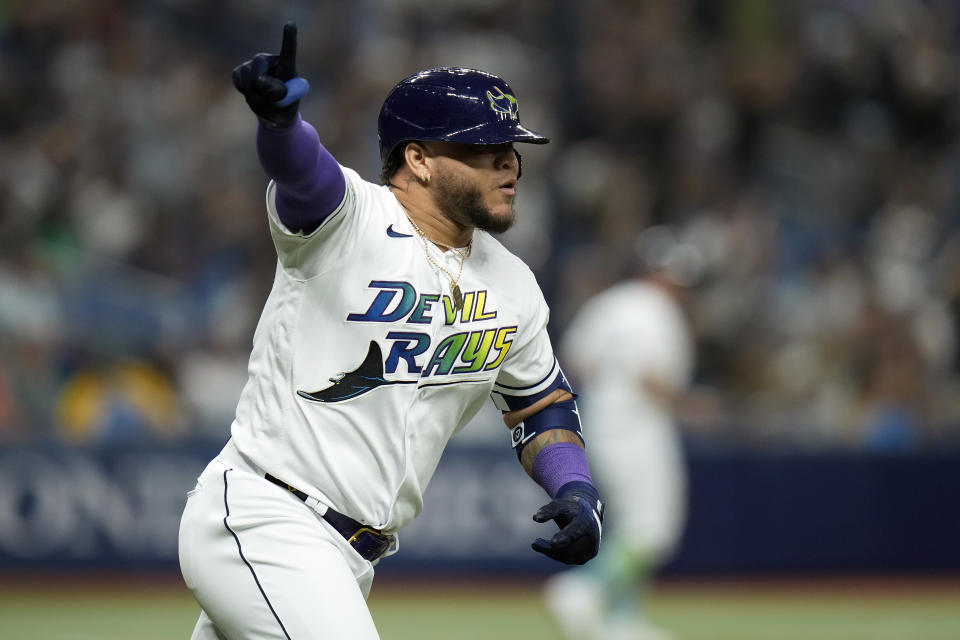 Tampa Bay Rays' Harold Ramirez celebrates his two-run home run off Seattle Mariners relief pitcher Isaiah Campbell during the seventh inning of a baseball game Friday, Sept. 8, 2023, in St. Petersburg, Fla. (AP Photo/Chris O'Meara)