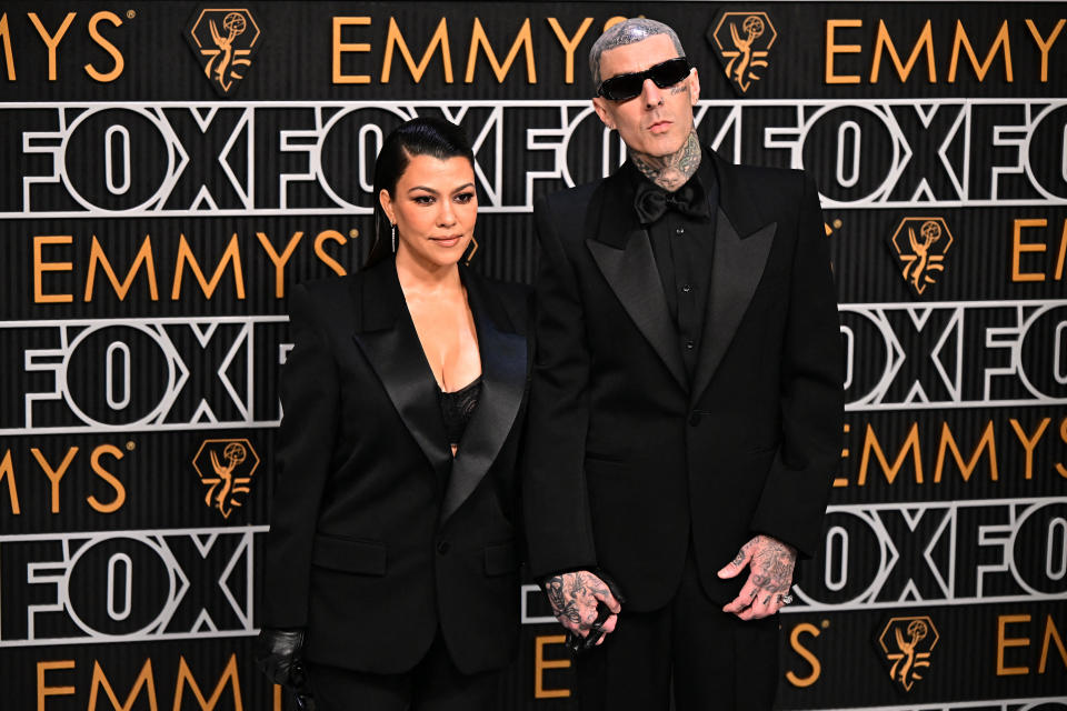 Kourtney Kardashian and her husband, musician Travis Barker attend the 75th Primetime Emmy Awards. / Credit: FREDERIC J. BROWN/AFP via Getty Images