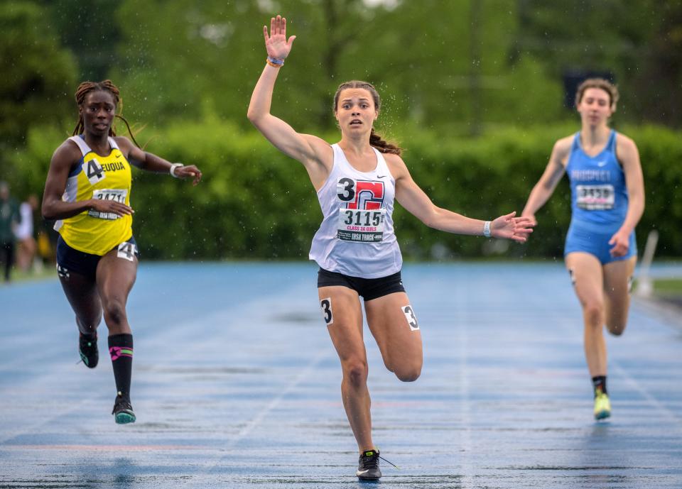 Chatham Glenwood's Katelyn Lehnen (3115) edges out a competitive field for a state title in the 200-meter dash during the Class 3A State Track and Field Championships on Saturday, May 21, 2022 at Eastern Illinois University.
