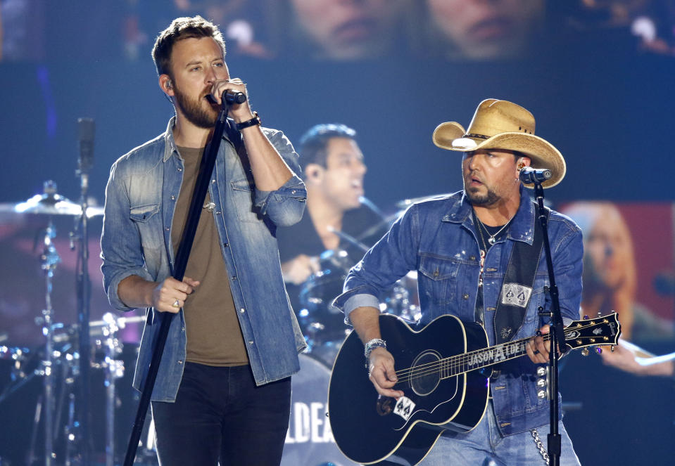 <p>Charles Kelley, left, and Jason Aldean perform “Midnight Rider” during a tribute to Greg Allman at the CMT Music Awards at Music City Center on Wednesday, June 7, 2017, in Nashville, Tenn. (Photo by Wade Payne/Invision/AP) </p>