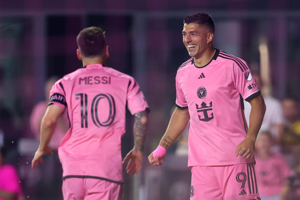 FORT LAUDERDALE, FLORIDA - MAY 4: Lionel Messi #10 of Inter Miami CF celebrates with Luis Suarez #9 after scoring a goal in the 50th minute against the New York Red Bulls during the second half of the match at DRV PNK Stadium on May 4, 2024 in Fort Lauderdale, Florida.  (Photo by Megan Briggs/Getty Images)