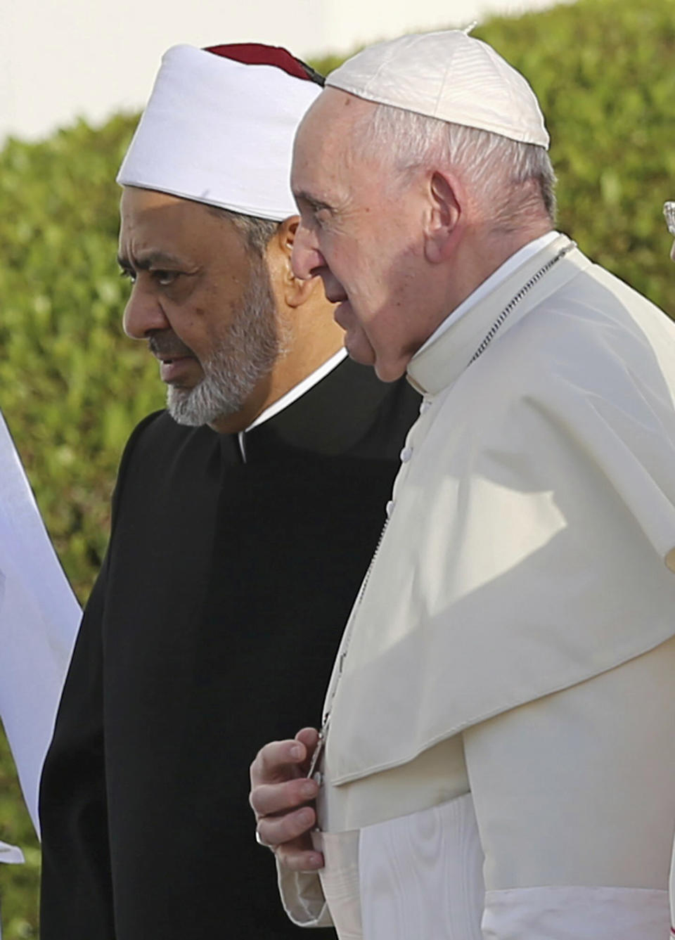 Pope Francis, right, and the Grand Imam of Al Azhar Ahmed el-Tayeb arrive at the Sheikh Zayed Grand Mosque in Abu Dhabi, United Arab Emirates, Monday, Feb. 4, 2019. Francis travelled to Abu Dhabi to participate in a conference on inter religious dialogue sponsored the Emirates-based Muslim Council of Elders, an initiative that seeks to counter religious fanaticism by promoting a moderate brand of Islam. (AP Photo/Kamran Jebreili)