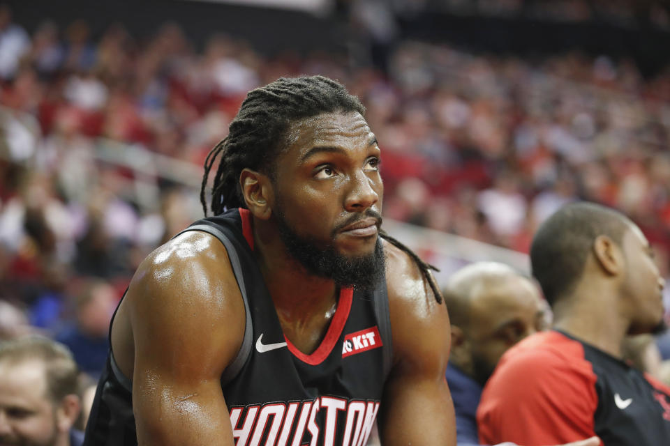 HOUSTON, TX - APRIL 05:  Kenneth Faried #35 of the Houston Rockets watches from the bench in the first half against the New York Knicks at Toyota Center on April 5, 2019 in Houston, Texas.  NOTE TO USER: User expressly acknowledges and agrees that, by downloading and or using this photograph, User is consenting to the terms and conditions of the Getty Images License Agreement.  (Photo by Tim Warner/Getty Images)