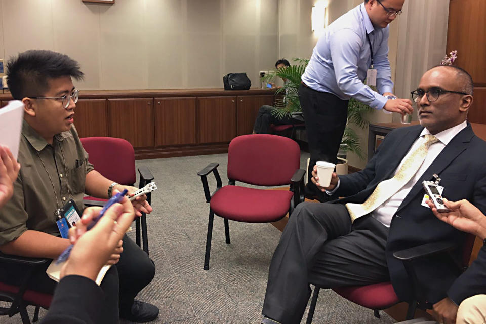 Hong Kong-based Singaporean academic Cherian George (right) addressing reporters on Tuesday (27 March) at the Parliament House. (PHOTO: Nicholas Yong/Yahoo News Singapore)