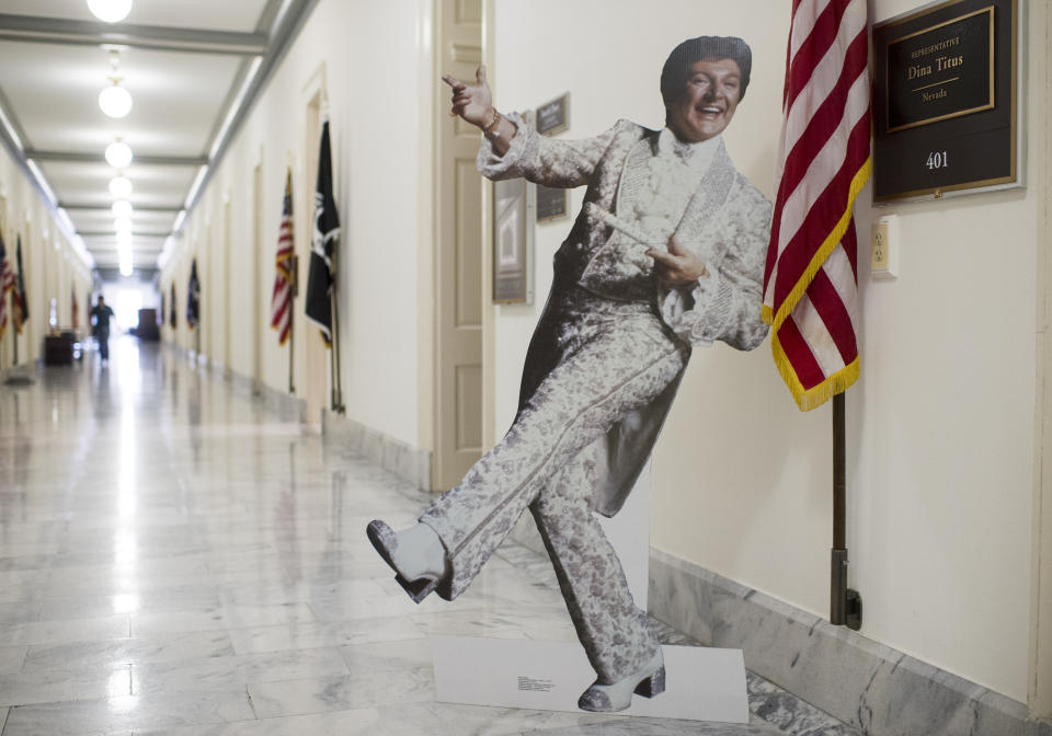 A cardboard cutout of Las Vegas star Liberace stands outside the office of Rep. Dina Titus (D-Nev.) in the Cannon House Office Building on Feb. 18, 2015.