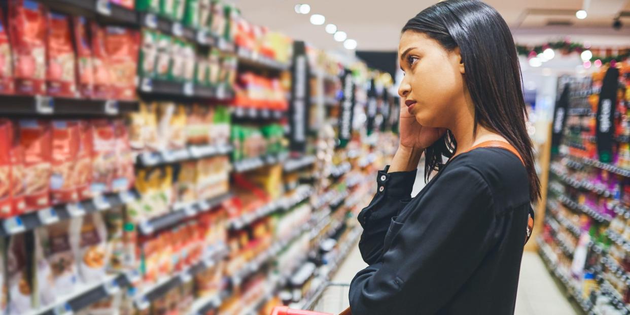 A woman shopping in a grocery store