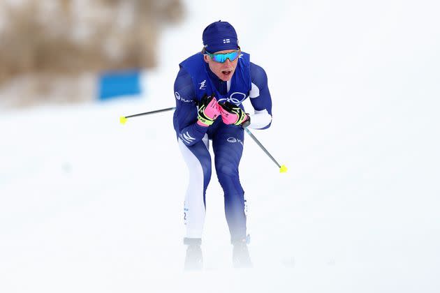 Remi Lindholm, pictured in an earlier race at the Beijing Winter Olympics, applied a heat pack to the affected area after Saturday's event. (Photo: Maja Hitij via Getty Images)