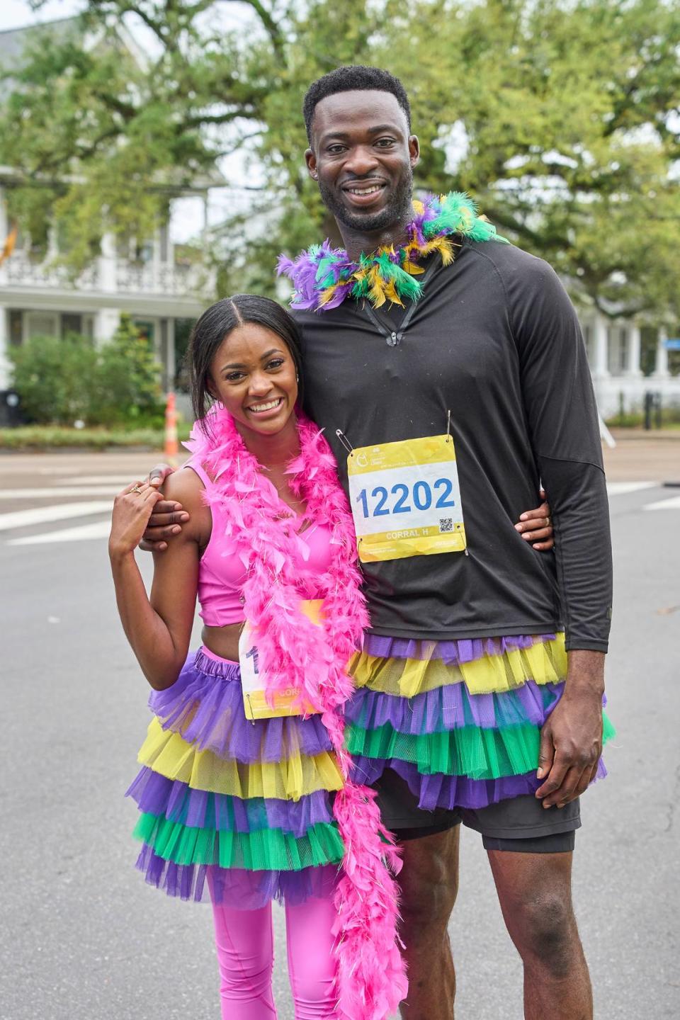 Charity and Dotun run a race together in New Orleans.