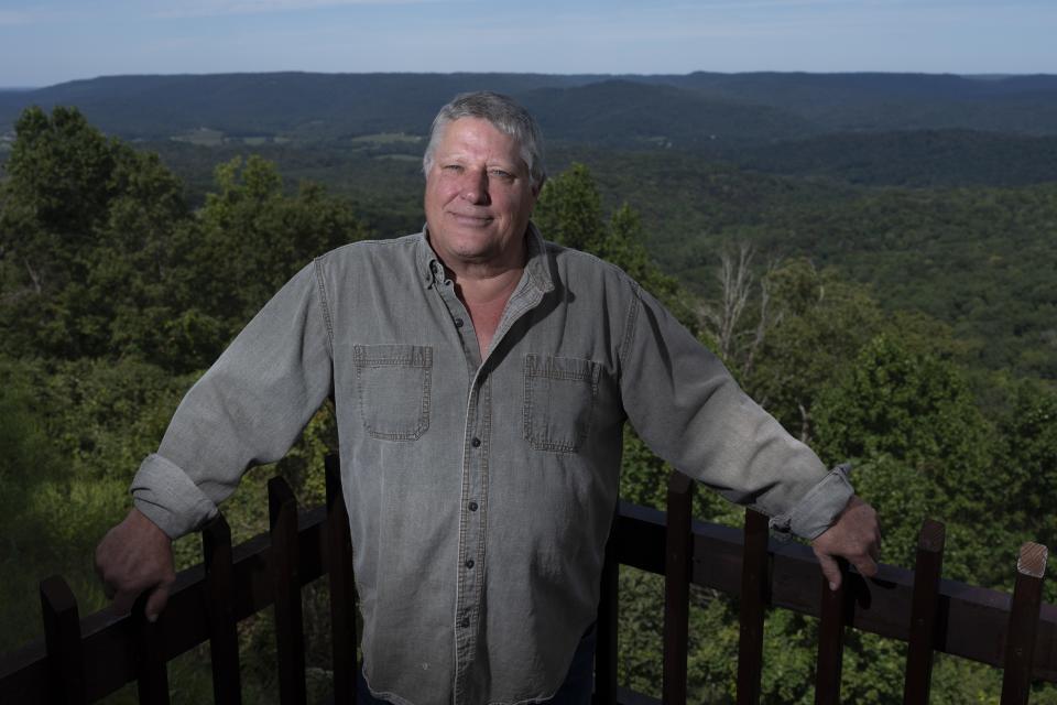 John Maas poses for a portrait Thursday, Sept. 14, 2023, in Sparta, Tenn. Thousands of people who helped clean up after the 2010 BP oil spill in the Gulf of Mexico say they got sick, including Maas. Attorneys familiar with the issue say he's the only one who has received a settlement after suing. (AP Photo/George Walker IV)