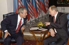 U.S. President George W. Bush, left, listens to Russian President Vladimir Putin during their meeting in the castle in Bratislava, Slovakia, Thursday, Feb. 24, 2005. (AP Photo/ITAR-TASS, Presidential Press Service, Alexei Panov)