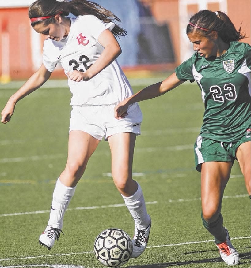 Hunterdon Central’s Gabby Stelzmiller (22) changes direction against Montgomery’s Colleen Gaffey on Friday, Sept. 6, 2013.