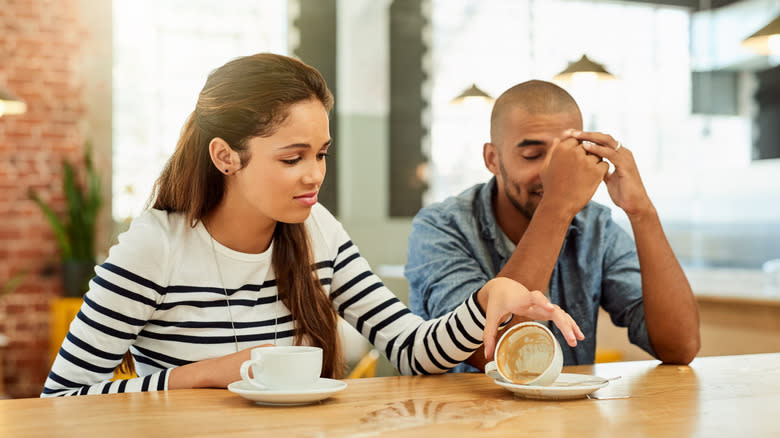 couple with spilled coffee