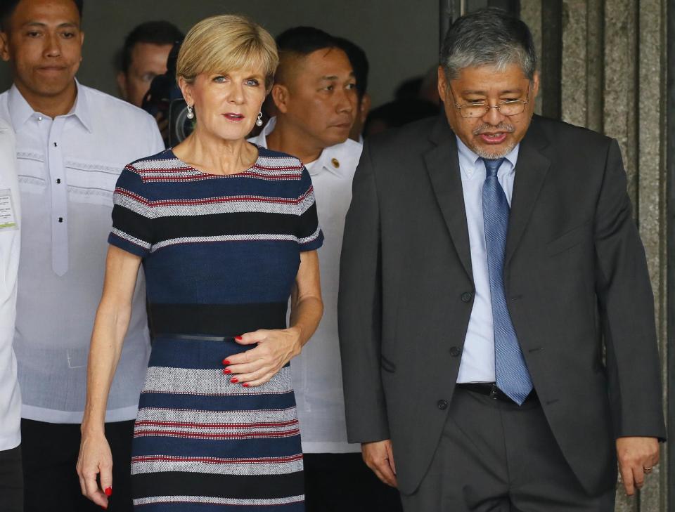 Australian Foreign Minister Julie Bishop, front left, is escorted by acting Philippine Foreign Affairs Secretary Enrique Manalo following their meeting Thursday, March 16, 2017 in suburban Pasay city, south of Manila, Philippines. Bishop is on a two-day visit to discuss bilateral relations between the two countries which includes a meeting with President Rodrigo Duterte. (AP Photo/Bullit Marquez)