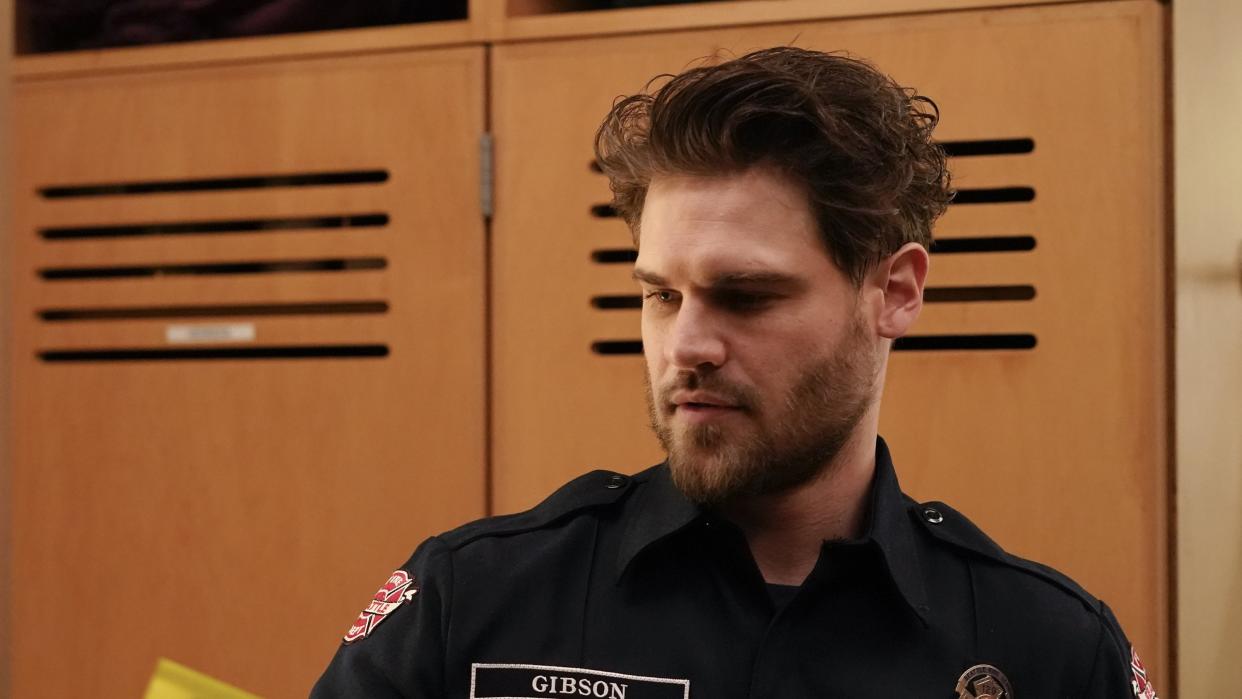  Grey Damon as Jack Gibson in the locker room in Station 19 season 7 premiere. 