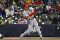 St. Louis Cardinals left fielder Tyler O'Neill hits a two-run home run against the Milwaukee Brewers during the first inning of a baseball game Wednesday, Sept. 22, 2021, in Milwaukee. (AP Photo/Jeffrey Phelps)