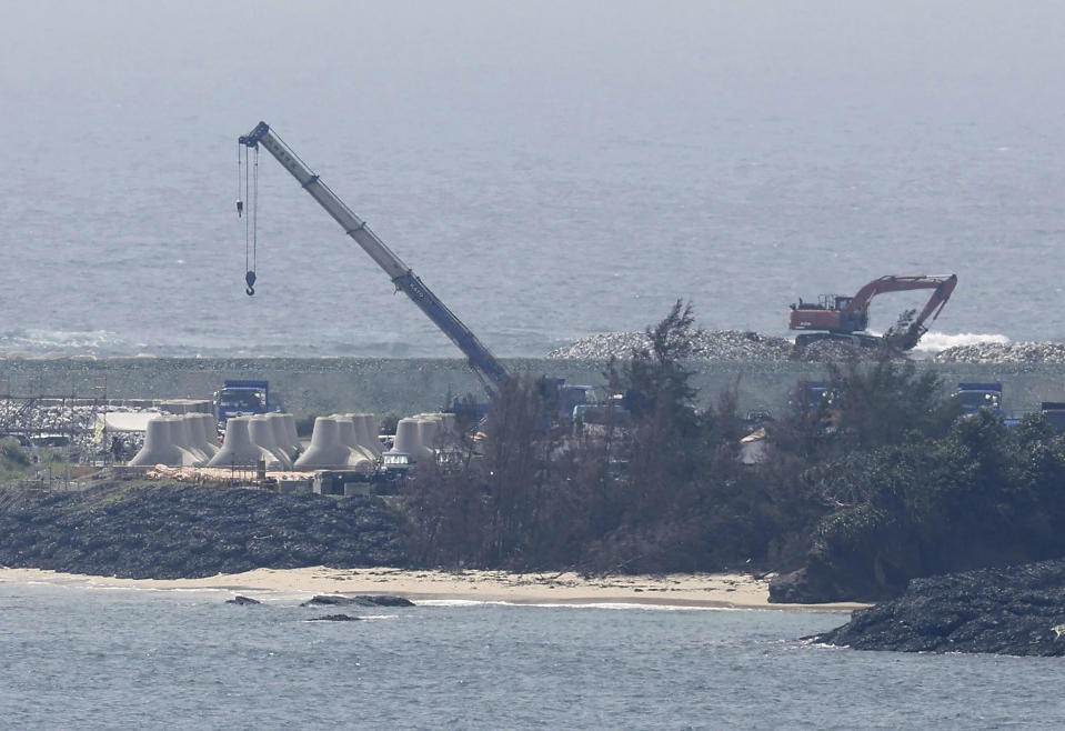 This show a construction work off Henoko in Nago, Okinawa prefecture, southern Japan Monday, Sept. 4, 2023, where the Japanese government plans to relocate a U.S. air base from one area of the prefecture to another. Japan’s Supreme Court on Monday dismissed Okinawa's rejection of a central government plan to build U.S. Marine Corps runways on the island and ordered the prefecture to approve it despite protests by locals who oppose the American troops' presence. (Kyodo News via AP)