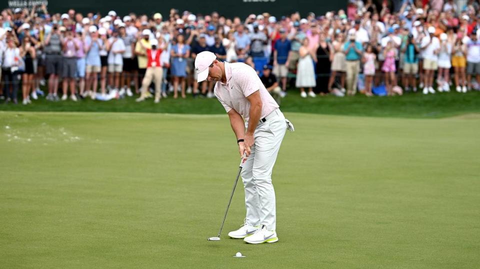 Golfer Rory McIlroy sinks the winning putt on the 18th green during final round action of the Wells Fargo Championship at Quail Hollow Club in Charlotte, NC on Sunday, May 9, 2021. McIlroy scored a 68 on the round and finished at -10.