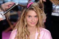 <p>Sarah Potempa’s Beachwaver hair clips helped with Megan Williams’s hair. <em>(Photo: Getty Images)</em> </p>