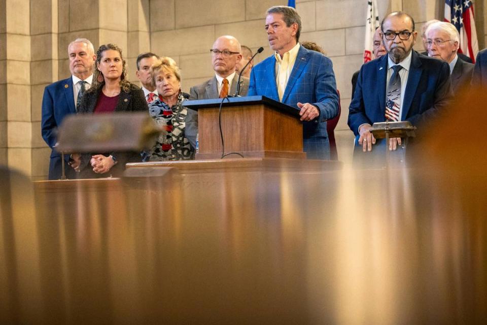 Gov. Jim Pillen is joined by other state senators as he announces that the state will participate in the Summer Electronic Benefits Transfer Program after previously saying Nebraska wouldn’t take part during a press conference in the Warner Chamber at the Capitol, Monday, Feb. 12, 2024, in Lincoln, Neb. (Kenneth Ferriera/Lincoln Journal Star via AP)