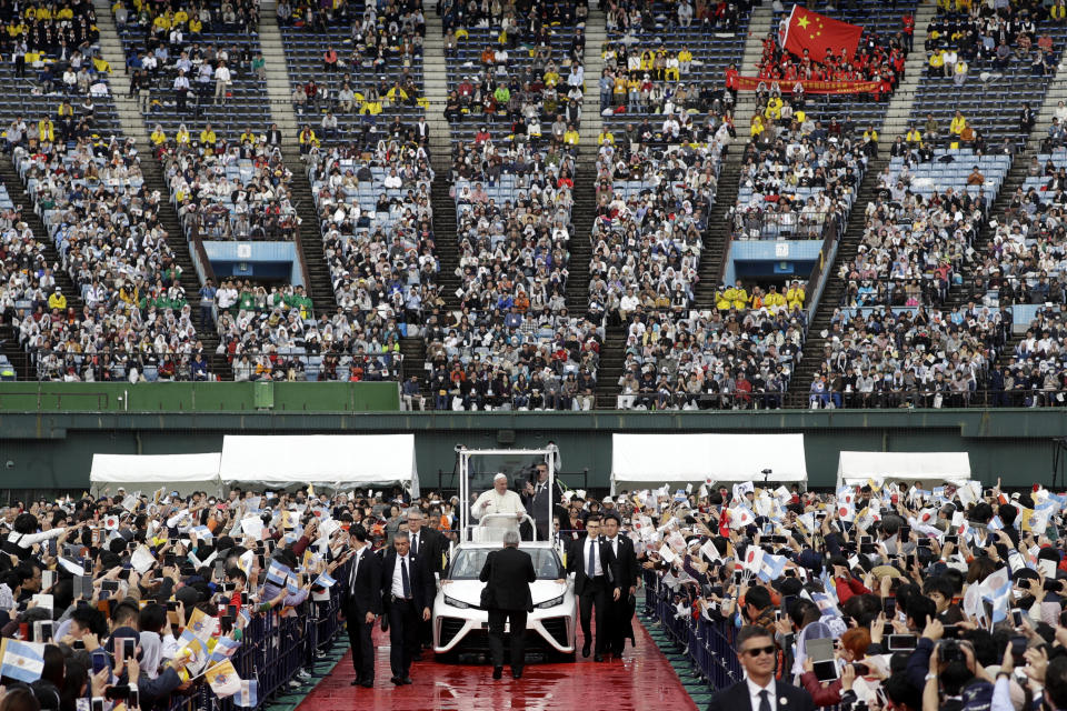 Pope Francis waves to the faithful as he arrives for a Mass at a baseball stadium Sunday, Nov. 24, 2019, in Nagasaki, Japan. (AP Photo/Gregorio Borgia)