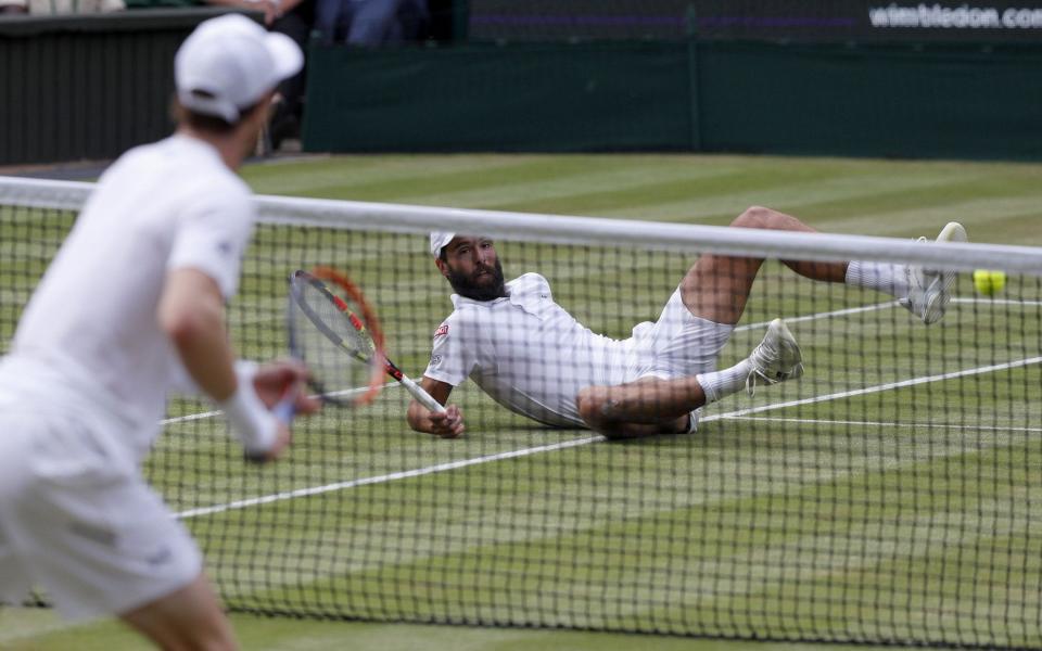 Andy Murray manipulates Benoit Paire all around the court despite his dicky hip - Credit: ADRIAN DENNIS/AFP