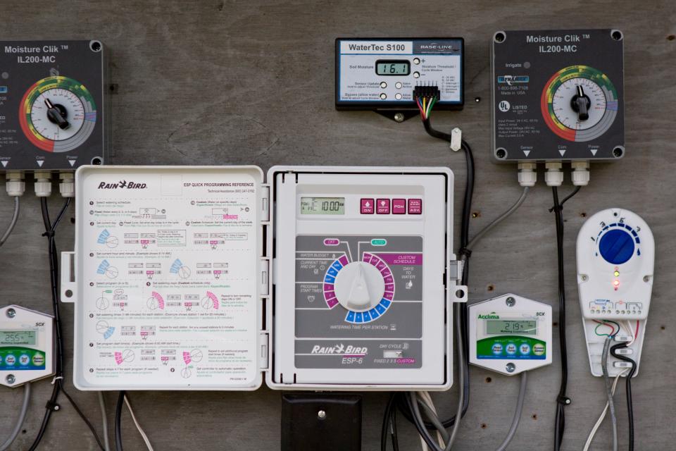 Control boxes for experimental irrigation system. IFAS research, irrigation, water management.