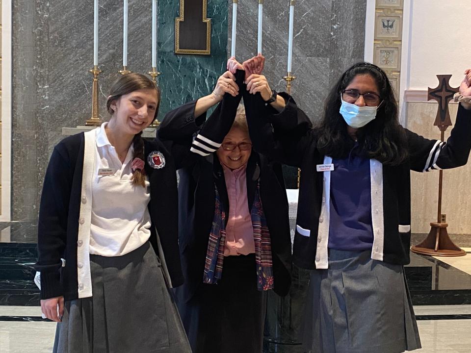 Diana Neste of Whitehouse Station, valedictorian; Sister Lisa D. Gambacorto, directress of Mount Saint Mary Academy, and Jerrine George of Edison, salutatorian.