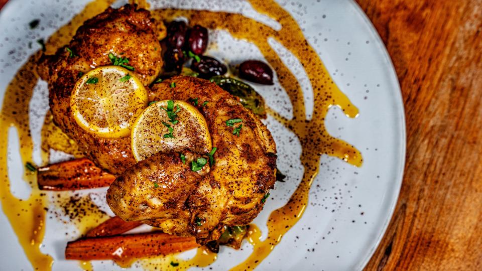 Roasted half chicken at Noosh Nosh restaurant in Louisville is a Halal-friendly dish.