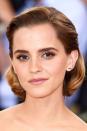 <p>Side parted, slicked back and curled under, Emma Watson's bob isa sculptural feat.</p>