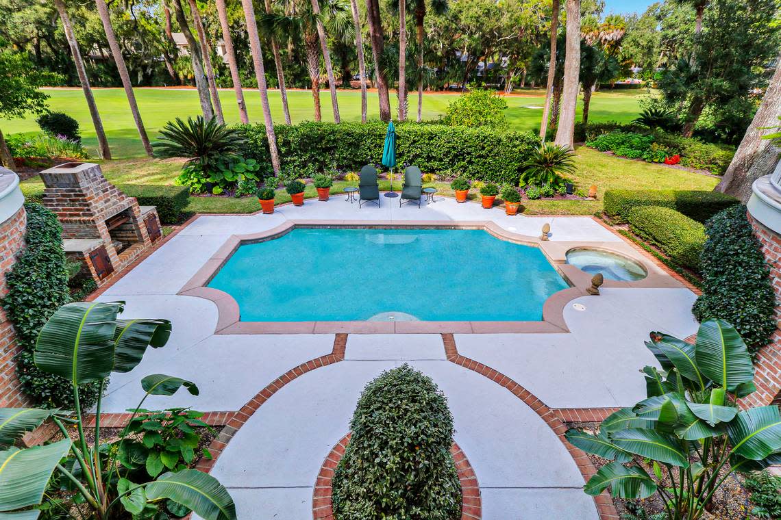 A view of the 16th fairway of the Atlantic Dunes Golf Course and the semi-private garden and pool of the four bedroom, three bath family estate listed for sale at $5.75 million on Hilton Head Island.