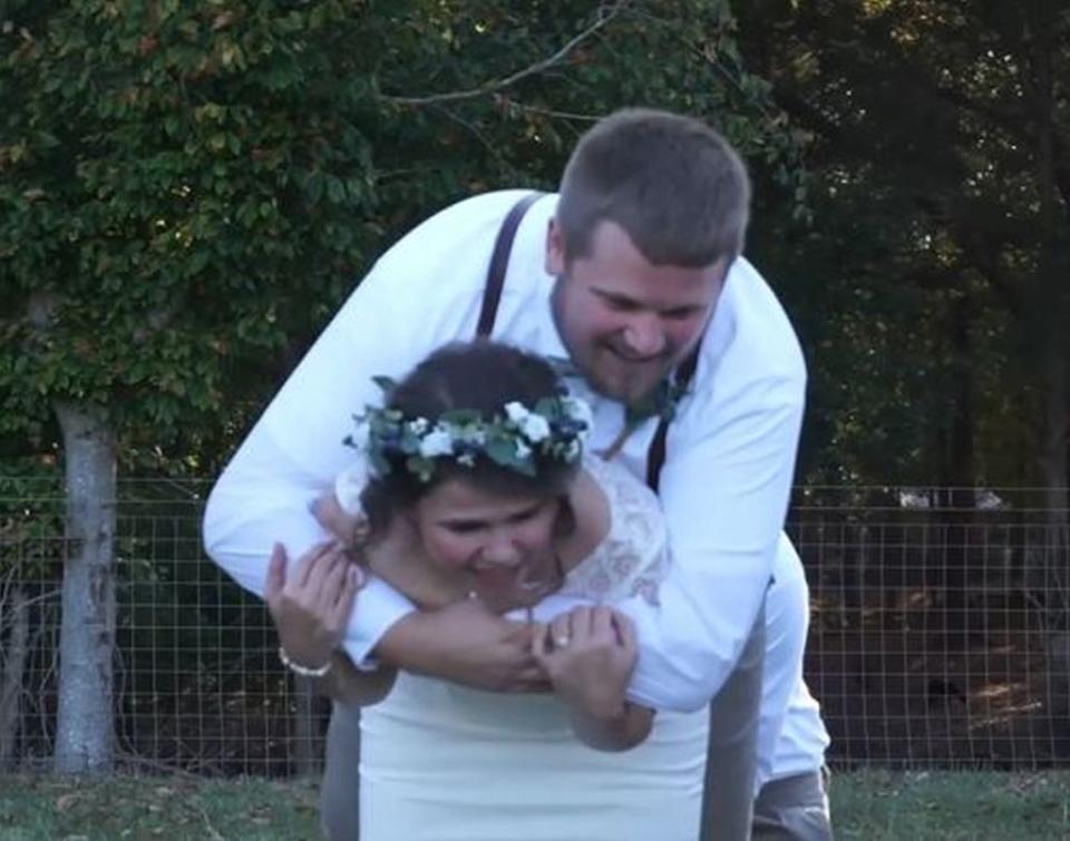 Bride breaks ankle giving 300 pound husband a piggyback ride. KennedyNews/LasleyMedia