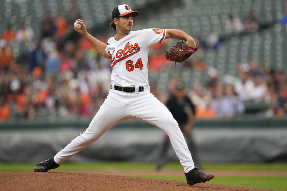 Baltimore Orioles starting pitcher Dean Kremer throws to the Houston Astros in the first inning of a baseball game, Thursday, Aug. 10, 2023, in Baltimore. (AP Photo/Julio Cortez)