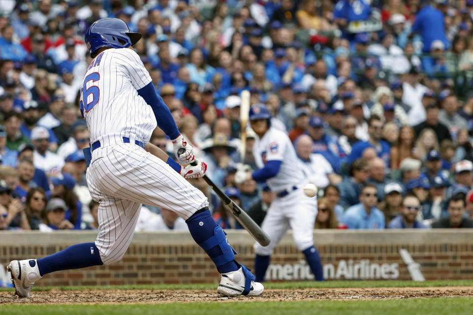 Chicago Cubs' Rafael Ortega hits an RBI-double against the St. Louis Cardinals during the fifth inning of the first baseball game of a doubleheader, Saturday, June 4, 2022, in Chicago. (AP Photo/Kamil Krzaczynski)