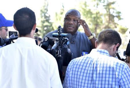 Retired NBA payer Mike Brown speaks to the media at the Sunrise Hospital, where former NBA player Lamar Odom has been hospitalized in Las Vegas, Nevada October 14, 2015. REUTERS/David Becker