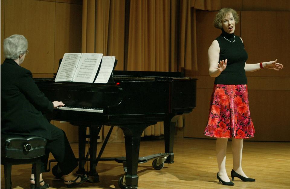 Amy Kendall, right, a soprano sings while Wanda Stubbart, left, plays the piano. The two performed selections from George Gershwin in a concert sponsored by Women in Music in 2005. Women in Music-Columbus facilitated many concerts through the years.