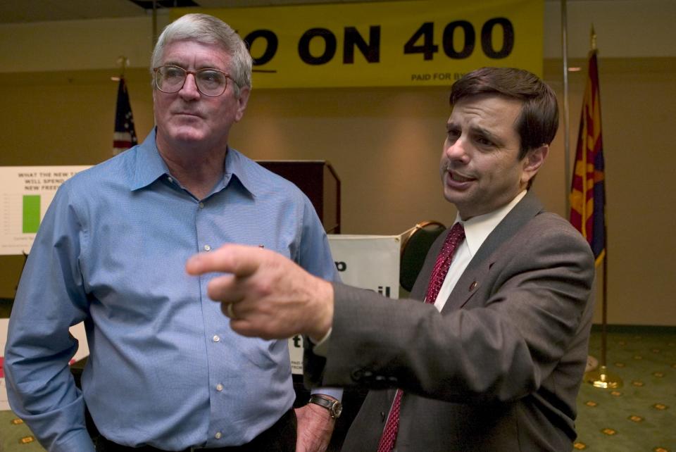 (Left to Right) Mesa Mayor Keno Hawker and Phoenix Mayor Phil Gordon speak in favor of Proposition 400 inside the Hyatt Hotel in Phoenix Wednesday afternoon, Sept. 15, 2004.