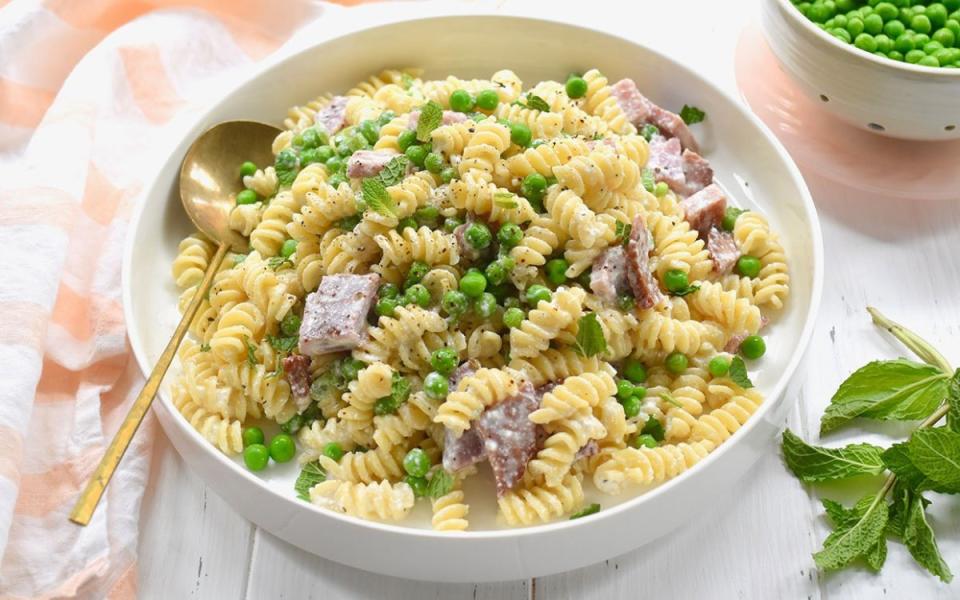 <p>Jocelyn Ruggiero</p><p>This pasta dish offers a fresh and speedy upgrade for ham extras, with a helping hand from creamy ricotta and a bright pop of mint.</p><p><strong>Get the recipe: <a href="https://parade.com/1017762/jocelynruggiero/this-creamy-fusilli-with-ham-peas-is-the-perfect-spring-pasta-recipe/" rel="nofollow noopener" target="_blank" data-ylk="slk:Creamy Fusilli With Ham and Peas;elm:context_link;itc:0;sec:content-canvas" class="link ">Creamy Fusilli With Ham and Peas</a></strong></p><p><strong>Related: <a href="https://www.yahoo.com/lifestyle/101-best-classic-simple-easy-152351315.html" data-ylk="slk:101 Best Pasta Suppers;elm:context_link;itc:0;sec:content-canvas;outcm:mb_qualified_link;_E:mb_qualified_link;ct:story;" class="link  yahoo-link">101 Best Pasta Suppers</a></strong></p>