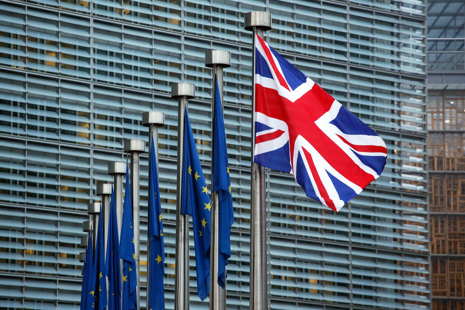 A UK flag flies outside the European Commission office in Brussels (Getty)