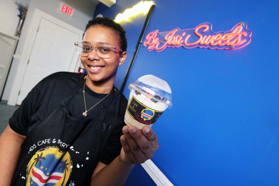 Josiana Monteiro, owner of Islands Cafe & Bakery By Josi Sweets, at the business at 91 Weir St. in Taunton on Tuesday, April 11, 2023.