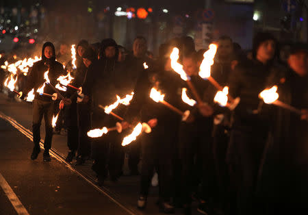 Members and supporters of several nationalist organizations take part in a march in commemoration of late General Hristo Lukov, a Bulgarian army commander, in Sofia, Bulgaria, February 16, 2019. REUTERS/Stoyan Nenov