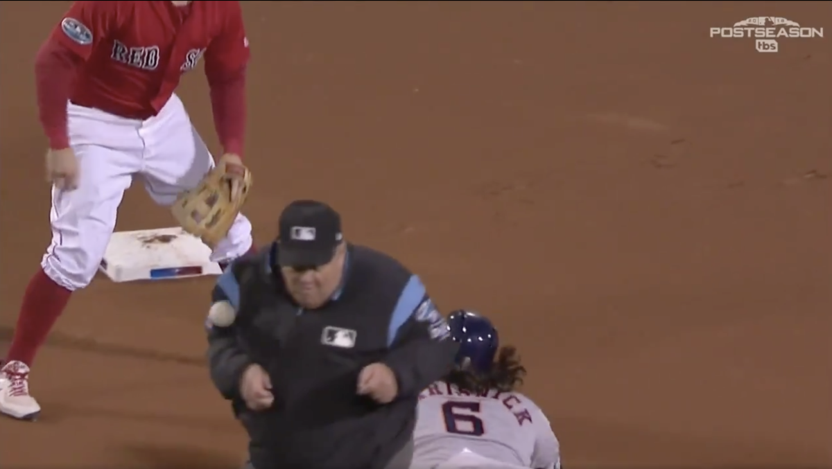 Umpire Joe West hit by errant throw in ALCS between Red Sox and Astros
