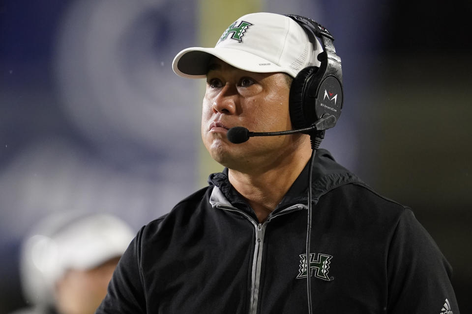 Hawaii head coach Timmy Chang walks the sideline in the first half of an NCAA college football game against Vanderbilt, Saturday, Aug. 26, 2023, in Nashville, Tenn. (AP Photo/George Walker IV)